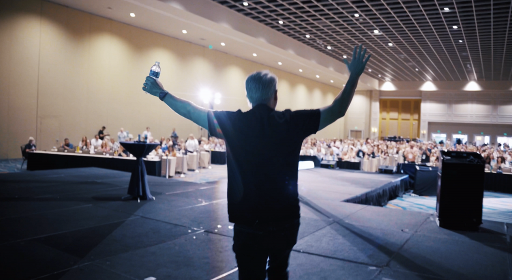 Dan Stewart professional speaker image on stage